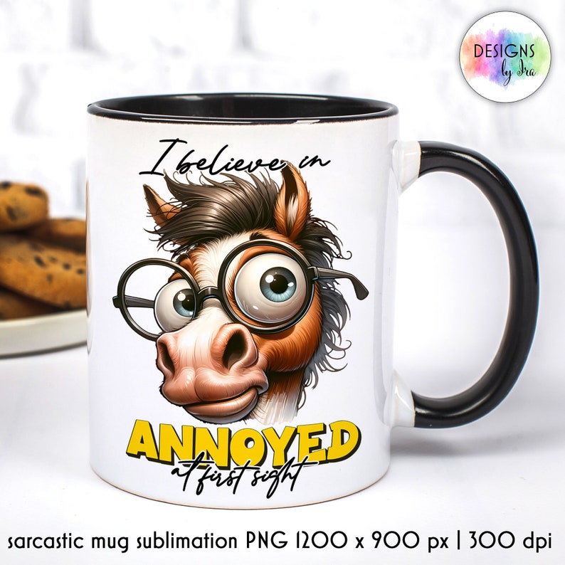 May include: White ceramic mug with a black handle and rim. The mug features a cartoon horse with glasses and the text "I believe in annoyed at first sight".