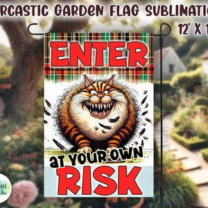 May include: A humorous garden flag with a cartoon cat and the text "ENTER AT YOUR OWN RISK". The flag is 12 inches by 18 inches and has a plaid background.