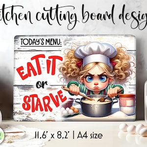 May include: A white cutting board with a distressed wood design featuring a cartoon chef girl stirring a pot with the text "TODAY'S MENU: EAT IT OR STARVE". The board measures 11.6 inches by 8.2 inches.