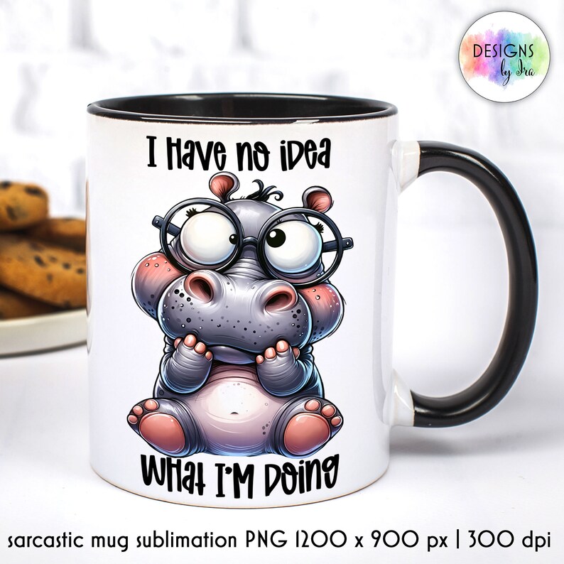 May include: White ceramic mug with a black handle and rim. The mug features a cartoon illustration of a gray hippopotamus wearing glasses and the text "I have no idea what I'm doing".