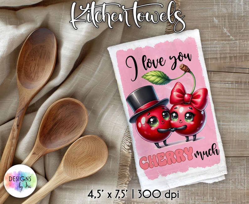 May include: A pink kitchen towel with a cartoon image of two cherries with faces. The cherries are wearing a top hat and a bow. The text "I love you CHERRY much" is printed on the towel.
