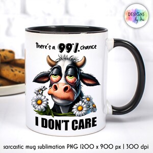 May include: White ceramic mug with a black rim and handle. The mug features a cartoon cow with a bored expression and the text "There's a 99% chance I don't care".