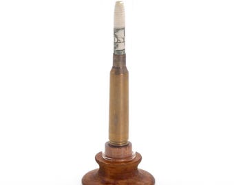 Dollar Bullet - Satirical assemblage art object from Nemo Gould