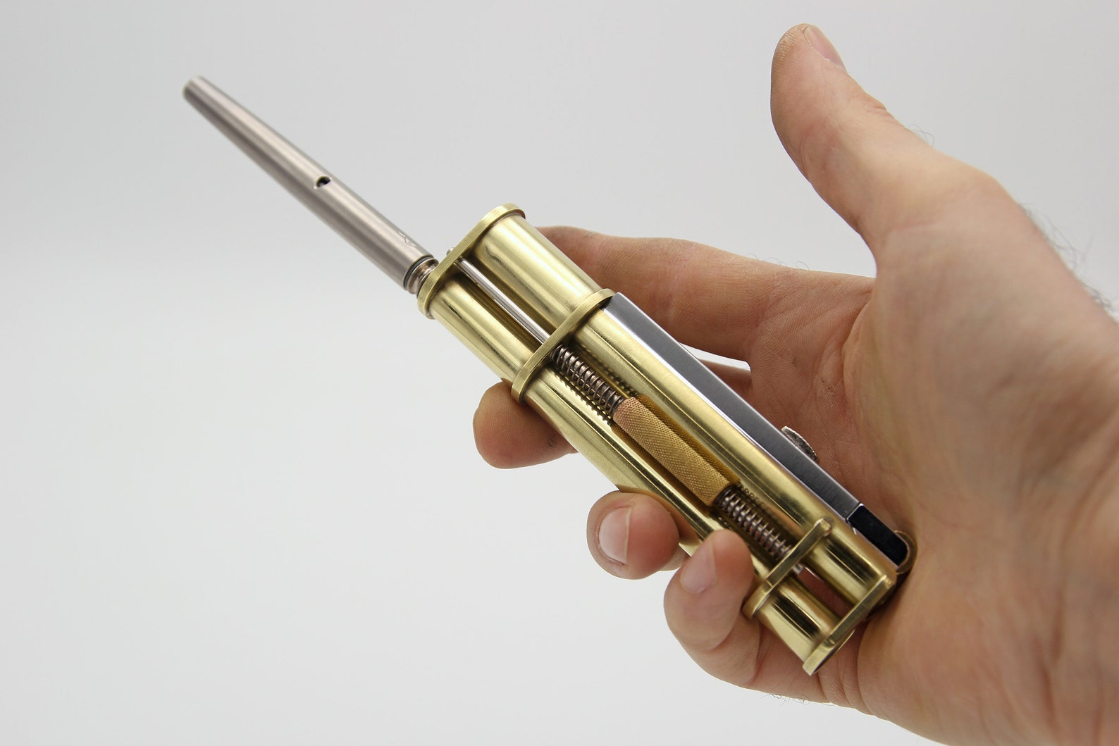Handmade brass stash with integrated lighter for Dynavap Handmade brass stash with integrated lighter for Dynavap