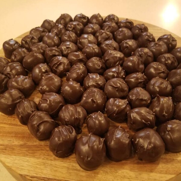 Three pounds of hand dipped peanut butter balls