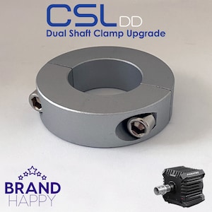 Op de afbeelding: Een zilveren dubbele as klem upgrade voor een CSL DD race stuur. De klem heeft twee zeskantige schroeven om vast te draaien.