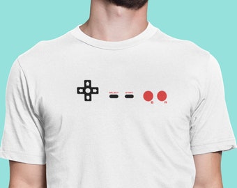 Diese Knöpfe zerprücken. Ein nostalgischer 8-Bit-Spieltrip mit dem NES Controller T-Shirt. UNISEX