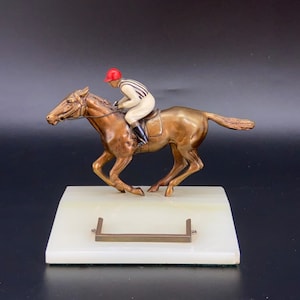 Bronze race horse and jockey in colours of Jimmy Joel circa 1930