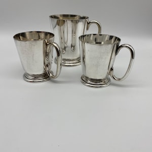 Mappin and Webb silver plated officially marked tankards from 1931 to 1933
