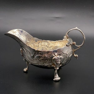 1760 Dublin Irish silver rococo jug, probably by Robert Calderwood