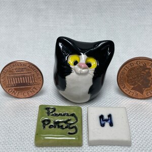 Miniature Ceramic Black & White Cats. Cute furry characters sold individually. Handmade by collected UK artist Penny Howarth H