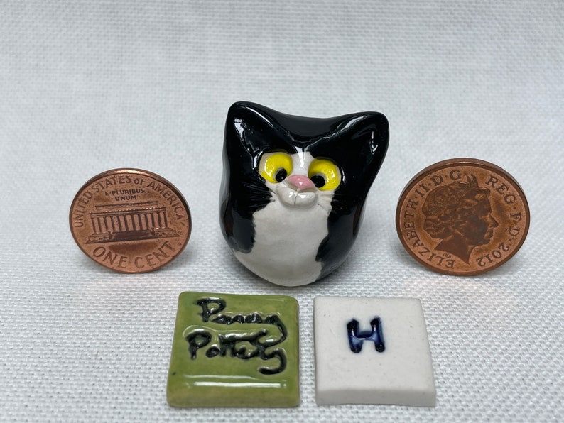 Miniature Ceramic Black & White Cats. Cute furry characters sold individually. Handmade by collected UK artist Penny Howarth H