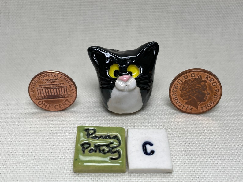 Miniature Ceramic Black & White Cats. Cute furry characters sold individually. Handmade by collected UK artist Penny Howarth C