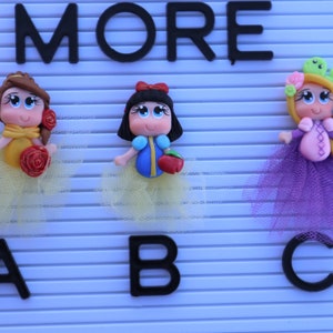 princess clays, clay doll, clays for bows, bow centers, bow supplies, clays for badge reel, bow centerpieces, clay embellishments, clays