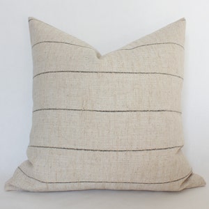 neutral striped throw pillow