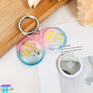 Astronaut Muster Serie Silikon Apfel Multicolor hängende Schnalle wasserdicht Airtag Fall für Haustierhalsbänder, Rucksäcke, Koffer, Geschenke für Jugendliche