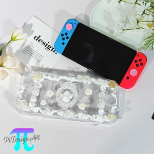Angel figurine and cream flower decoration Switch case for Switch 2,Switch OLED,Switch Lite, Switch case with card slot,gift for game lovers