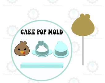 May include: A selection of cake pop moulds and a turkey-shaped cake pop on a stick. The moulds are light blue and the cake pop is brown with a yellow beak and red tongue. The text "CAKE POP MOLD" is in black.