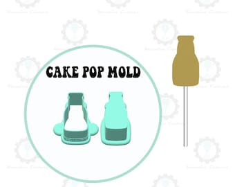 Peut inclure: Un moule à cake pops bleu clair en forme de bouteille, avec le texte "CAKE POP MOLD" en noir. Un cake pop séparé, de couleur beige, est également montré sur un bâton.