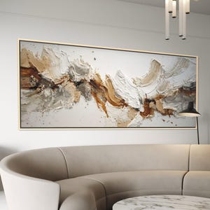 May include: A large rectangular wall art piece featuring heavy impasto texture with a palette of white, cream, beige, and deep brown tones. The paint is applied in thick, sweeping strokes that create a dynamic, layered, and dimensional abstract composition.