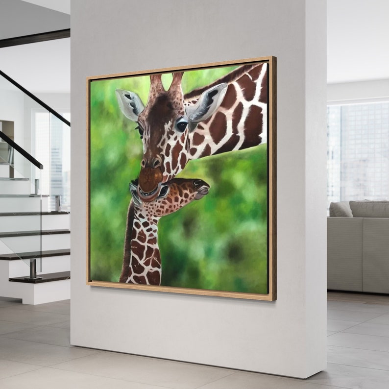 May include: A painting of a mother giraffe and her baby giraffe. The mother giraffe is brown and white with a long neck and a gentle expression. The baby giraffe is smaller and has a more playful expression. The background is a blurred green.
