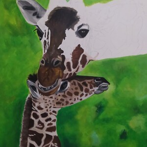 May include: A painting of a mother giraffe and her baby giraffe. The mother giraffe is white with brown spots and the baby giraffe is brown with white spots. The background is a green field.