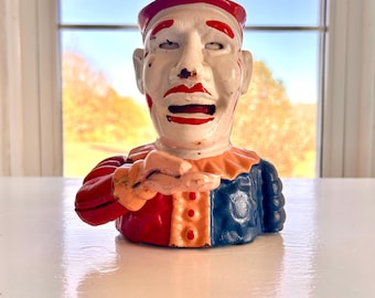 Hucha mecánica vintage de hierro fundido de los años 40 con forma de payaso bufón de Humpty Dumpty