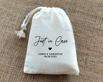 May include: White cotton drawstring bag with the text "Just in Case" in black cursive font, a small black heart, and the names "James & Samantha" and the date "08.08.2023" printed below.