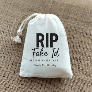 May include: White drawstring bag with the text "RIP Fake Id Hangover Kit Sara's 21st Birthday" printed in black.