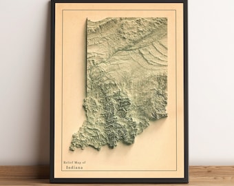 May include: A vintage-style relief map of Indiana, printed on cream-coloured paper and framed in black. The map shows the state's topography with green shading to indicate elevation.