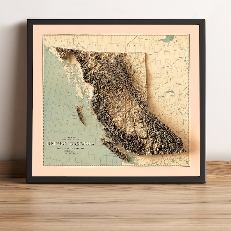 British Columbia vintage framed shaded relief map in black frame. Artistic print highlighting mountains with a realistic terrain effect