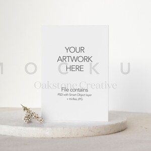May include: A white card mockup with the text "YOUR ARTWORK HERE" and "Oakstone Creative" with the text "File contains PSD with Smart Object layer + Hi-Res JPG" below.