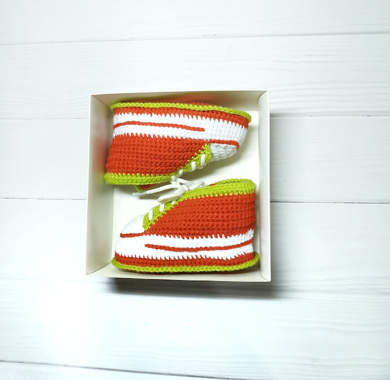 Sport knitted shoes for baby. Crochet booties sneakers for girl