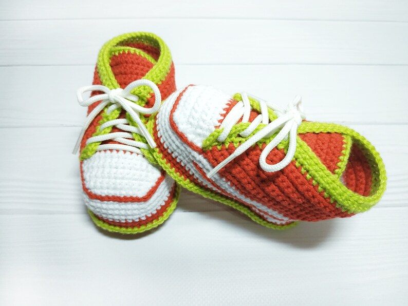 Sport knitted shoes for baby. Crochet booties sneakers for girl