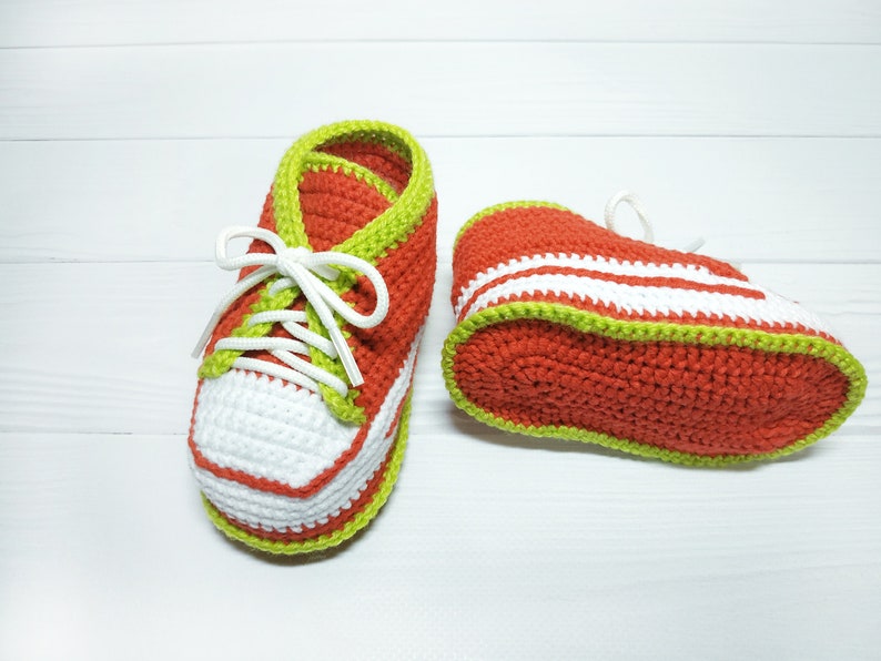 Sport knitted shoes for baby. Crochet booties sneakers for girl