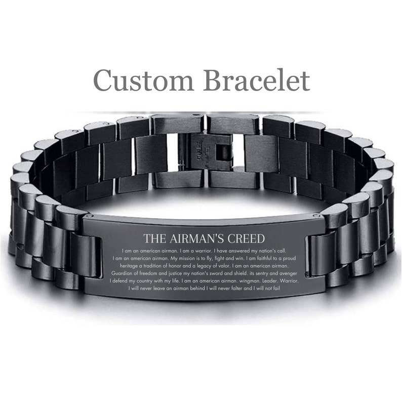 a stainless steel bracelet with an inscription on it