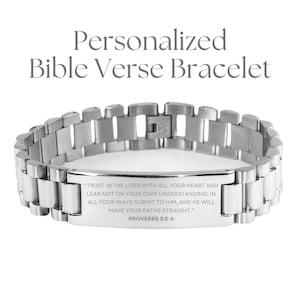 May include: A silver stainless steel bracelet with a rectangular tag engraved with the Bible verse Proverbs 3:5-6. The verse reads "Trust in the Lord with all your heart and lean not on your own understanding; in all your ways submit to him, and he will make your paths straight."