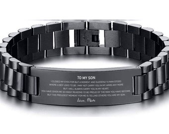 May include: A black stainless steel bracelet with a rectangular plate engraved with the message "TO MY SON" and a heartfelt message from "Love, Mom". The bracelet features a link design and a secure clasp.