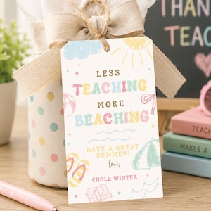 May include: A gift basket with a tag that reads "Less Teaching More Beaching." The tag has beach-themed illustrations and the words "Have a Great Summer!" and "love, Chole Winter." A chalkboard in the background says "Thank You Teacher!"