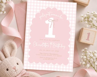 May include: A rectangular birthday invitation card with a pink and white gingham pattern, featuring a scalloped arch design, a large white number 1 with a bow, and text reading girls just wanna be 1, Charolette's 1st Birthday, 04.25.2025 AT 2PM.