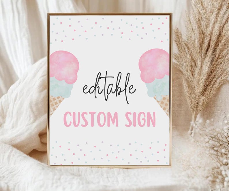 May include: A framed sign with a gold border features two watercolour ice cream cones with pink and blue scoops. The words "editable CUSTOM SIGN" are displayed in black and pink, with a scattering of pink and blue dots.