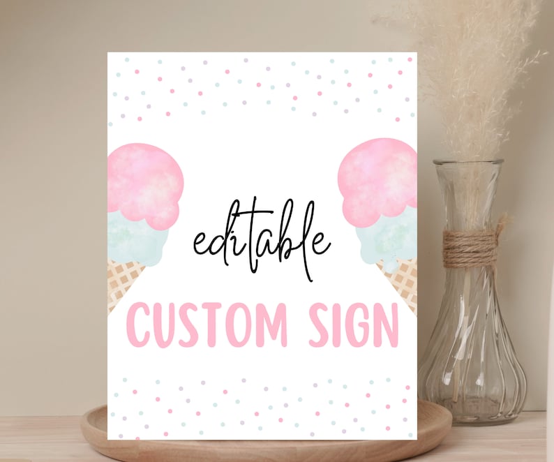 May include: A white sign featuring two watercolour ice cream cones with pink and blue scoops, and waffle cones. The sign reads "editable CUSTOM SIGN" in pink and black script. Pastel confetti dots decorate the top.