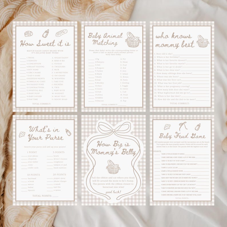 May include: Set of six beige baby shower games with brown text. Games include "How Sweet It Is," "Baby Animal Matching," "Who Knows Mommy Best," "What's in Your Purse," "How Big is Mommy's Belly," and "Baby Feud Game."