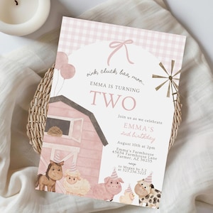 May include: A pink and white birthday invitation with a farm theme. The text reads "Emma is turning two." The design includes illustrations of farm animals, a barn, and a windmill. The invitation includes event details.