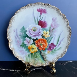 Vintage Hand-Painted Porcelain Floral Plate – 8” Diameter with Gilded Details and a Vibrant Bouquet