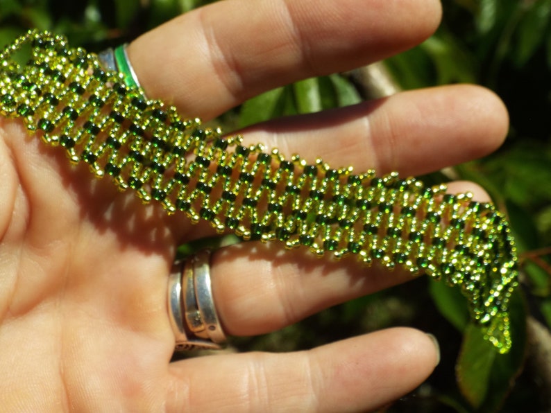 Seed bead bracelet in greens With a ball and loop closure. Native tribal boho Green bracelet