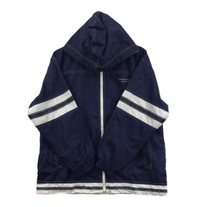 May include: Navy blue hooded jacket with white accents. Features a full-length zipper, white stripes on the sleeves, and the text "COURR&Egrave;GES SPORTS F." on the chest. The jacket has a white hem and hood trim.