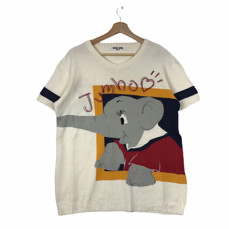 Vintage JUMBO ELEPHANT DISNEY Cartoon Animation Knitwear White Shirt - .br Vintage JUMBO ELEPHANT DISNEY Cartoon Animation Knitwear White Shirt - .br