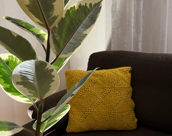 Knitted yellow pillowcase