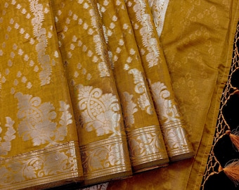 Mud Gold Color Semi Banarasi Silk Saree with Muted Gold Zari Weave